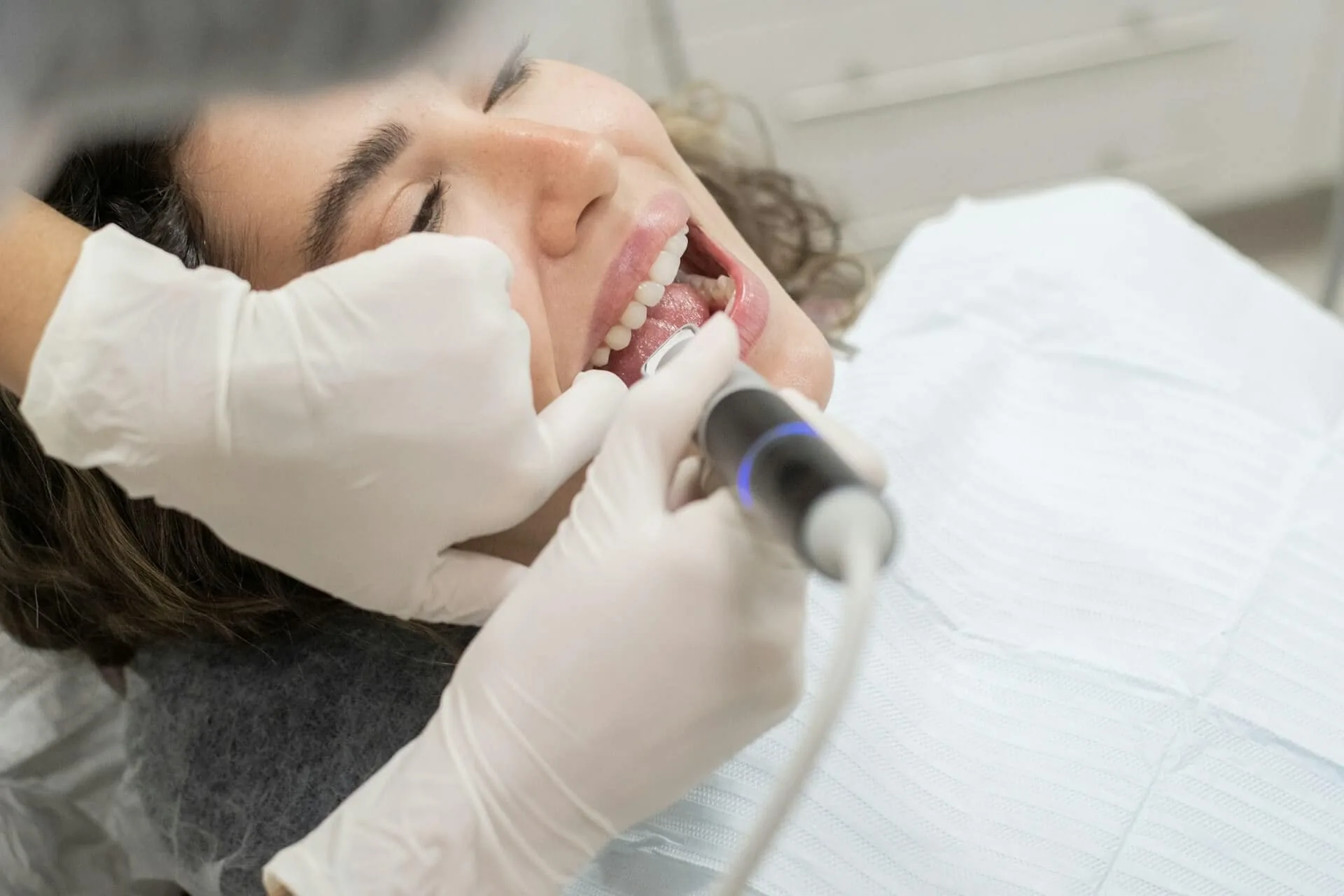A woman getting her teeth checked