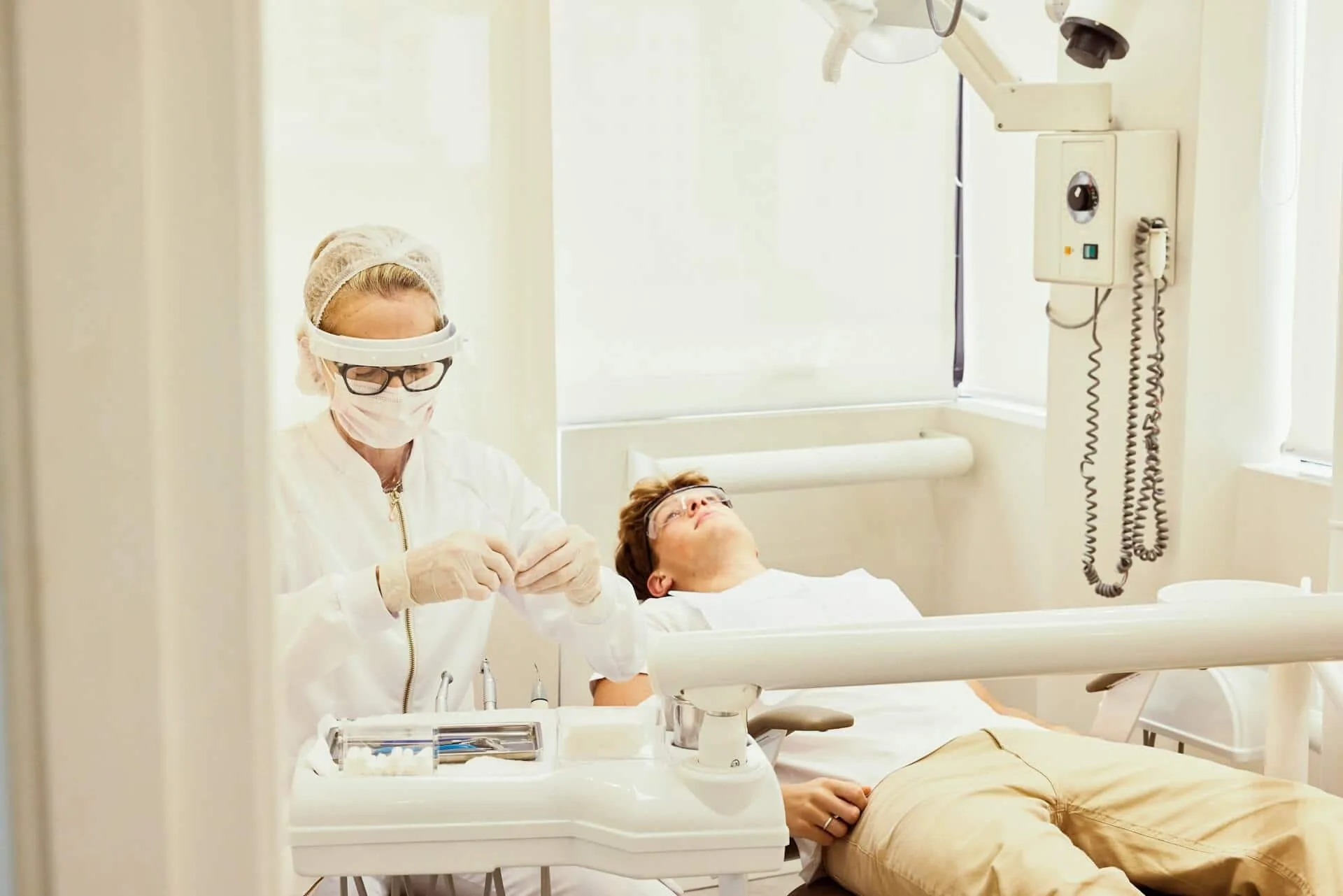 A patient lying on a dental chair