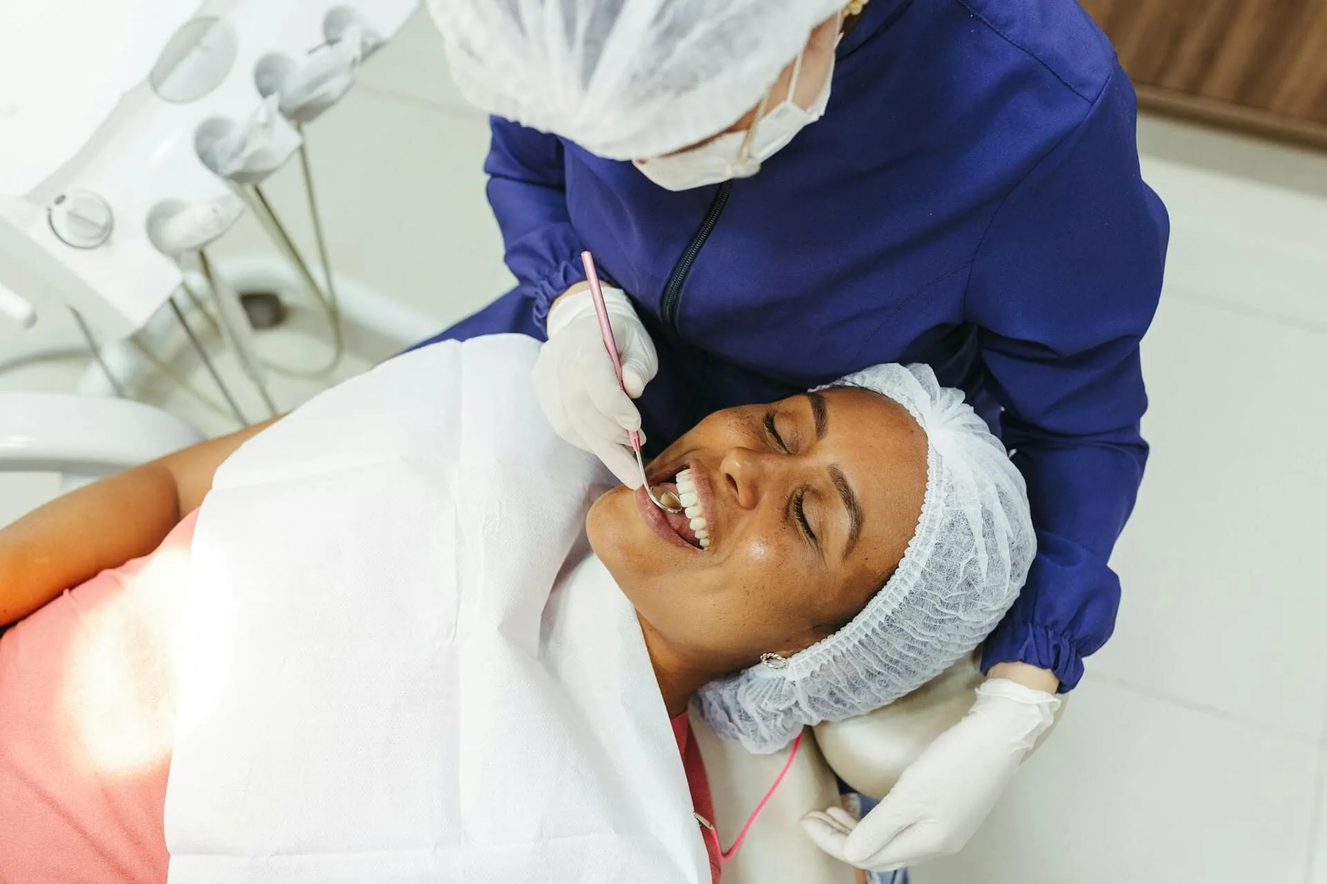 A patient lying on a dental chair